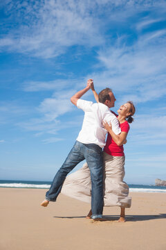 Couple Dancing on the Beach, Camaret-sur-Mer, Crozon Peninsula, Finistere, Brittany, France