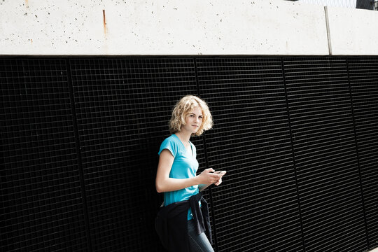 Girl Holding Tablet in Playground, Mannheim, Baden-Wurttemberg, Germany