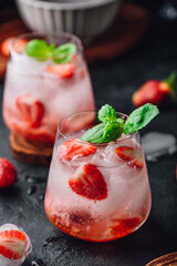 Cocktail with strawberry, gin and soda