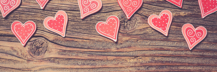 Hearts on wooden background - 591634663