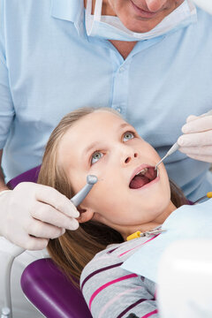 Dentist Checking Girl's Teeth at Appointment, Germany