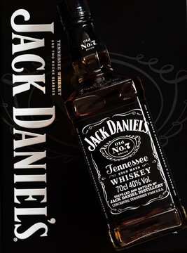 Jack Daniel's bottle and metal box gift on black background
