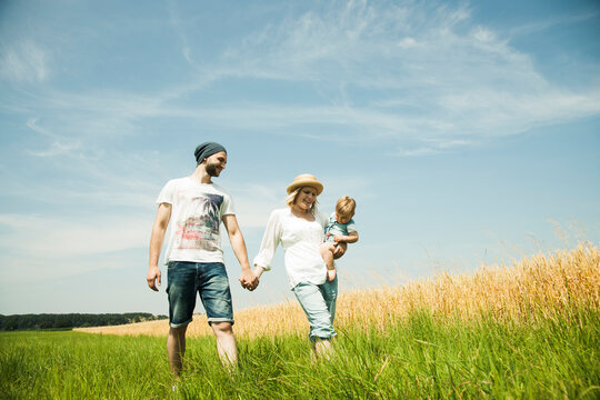 Family Walking by Agricultural Field, Mannheim, Baden-Wurttemberg, Germany