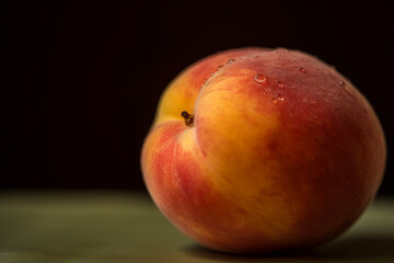 Fototapeta na wymiar peach on black background