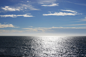 Obraz premium Ocean, sea, background and texture. Blue water background. Ripple sea ocean water surface. ocean water surface. close up blue water surface at deep ocean. Dark blue background