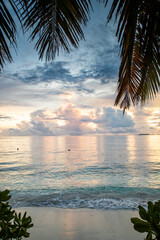 Fototapeta na wymiar amazing sunset over the sea on a tropical island