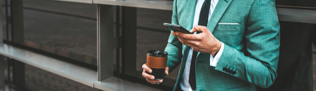 Close-up Image Of Business Man Watching Smart Mobile Phone Device Outdoors - Businessman Networking Typing An Sms Message In City Street