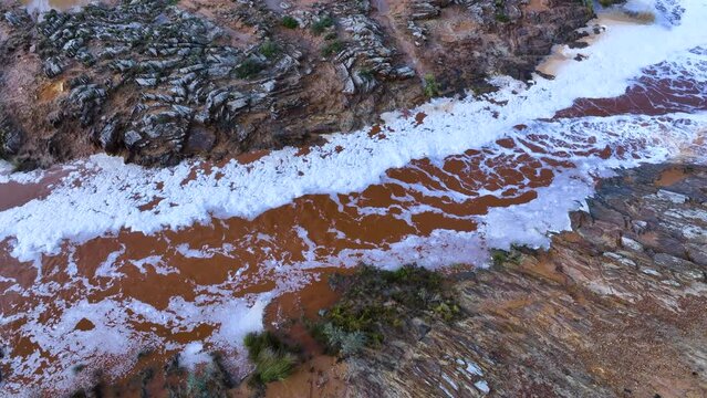 Rio Tinto textures. Aerial view from a drone in the surroundings of the town of Berrocal. Sierra Morena, Gulf of C&aacute;diz, Huelva, Andalusia, Spain, Europe