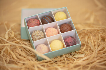 appetizing gourmet chocolate bonbons in a box