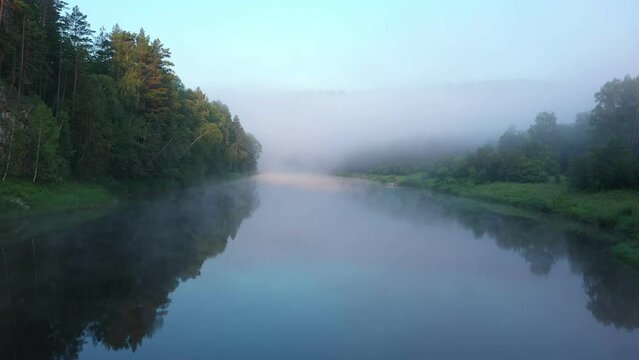 Misty morning on the river. Aerial view