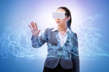 Virtual reality concept with woman and VR goggles