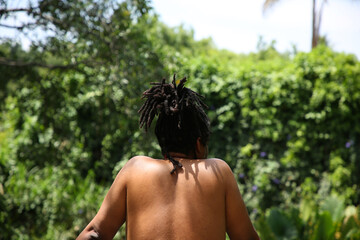 afro man with rainforest background