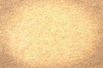 Golden brown paper texture and light.