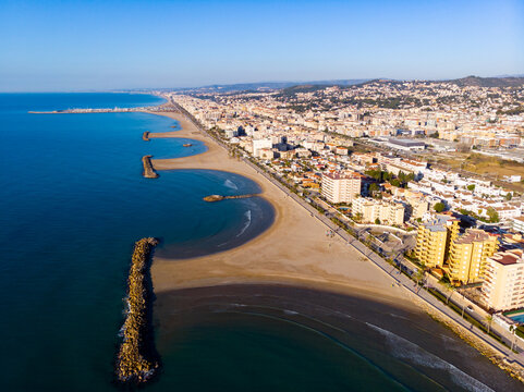 Aerial drone view of Playa de Cunit on sunny winter day, Tarragona, Spain