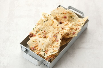 Rempeyek Kacang, crackers made from rice flour with sliced ​​peanuts. Indonesian traditional food
