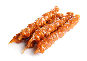 Pile of tasty churchkhela on white background