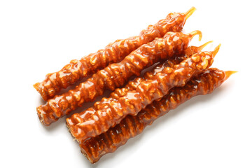 Pile of tasty churchkhela on white background