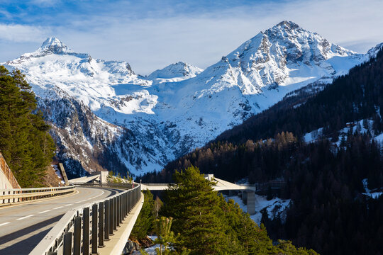 View on Ganter bridge and snowy Alps mountains near Brig at Valais, Switzerland, in winter