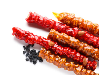 Delicious churchkhela, almond nuts and raisins isolated on white background