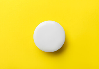 Blank white badge on yellow background