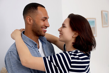 Dating agency. Happy couple enjoying time together at home