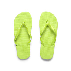 Pair of green flip-flops on white background