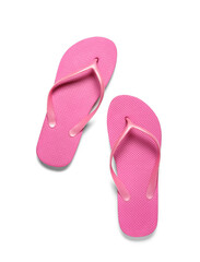 Pair of pink flip-flops on white background