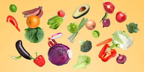 Many fresh vegetables and fruits falling on gold background