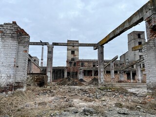 Vinnytsia Ukraine Chemist plant ruins and ruins of plant over time it looks more and more like shell hit and destroyed everything around there are no people no life only grass sprouts on bricks