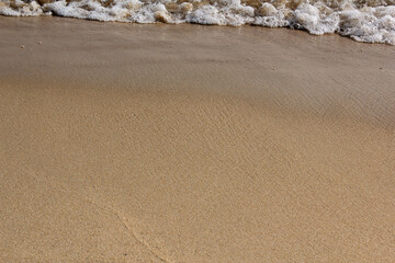 Sand beach and wave