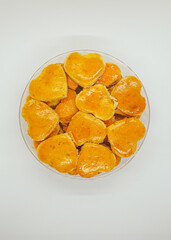 peanut cookies or kue kacang, are pastries made from various ingredients such as wheat flour, peanut butter, milk powder cooked in an oven. has a delicious and savory taste, perfect for Eid cakes