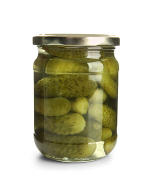 Jar with tasty fermented cucumbers on white background
