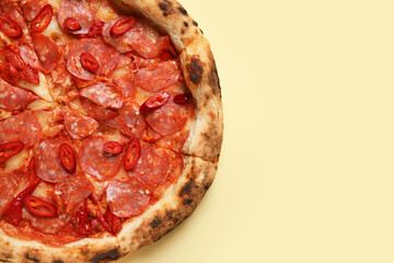 Delicious pepperoni pizza on beige background