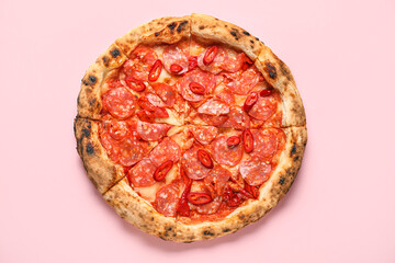 Delicious pepperoni pizza on pink background