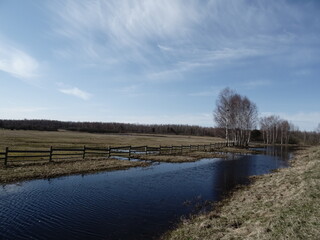 pond in front of the field
