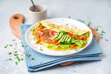 Tasty omelet with vegetables on color grunge background