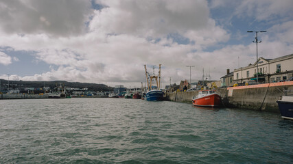 Naklejka premium boats in the harbor in Howth Ireland