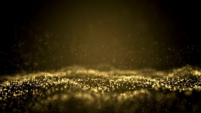 Abstract gold dust particles moving randomly