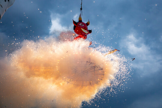A papier-mache figure of "Judas" burns by a fireworks explosion in an annual celebration in Tultepec, Mexico.