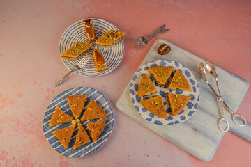 Typical middle eastern desserts. 
Basbousa or semolina cake and different types of Konafa 
This is the Arabic names of these desserts. 