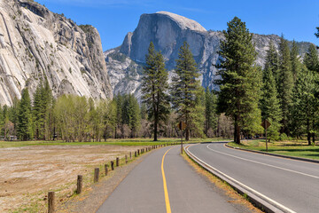 Half Dome - A closeup view of Half Dome, as seen from Yosemite Valley Loop Road, on a peaceful sunny Spring day. Yosemite National Park, California, USA.
