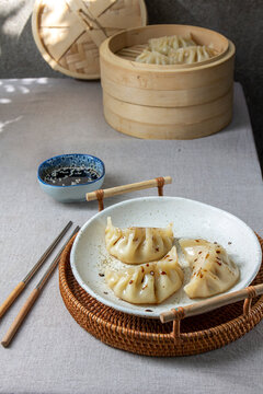 Gyoza Japanese korean dumplings on gray plate on the table
