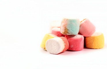 few colored marshmallow on white background