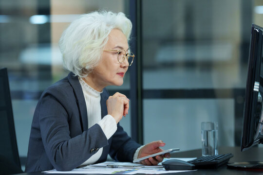 Elderly ladies work in business