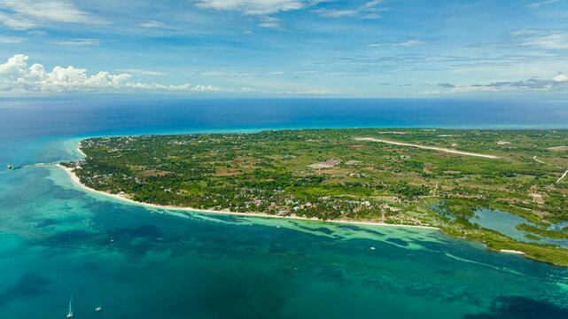 Aerial seascape with tropical island and beach in the sea. Bantayan island, Philippines. © Alex Traveler