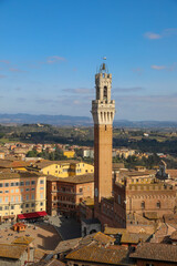 Fototapeta na wymiar Tower called del Mangia in The Main Square of the City of Siena in Tuscany in Italy