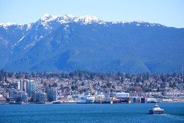 Naklejka premium Panorama of North Vancouver with Sea Bus View from Canada Place, Vancouver, BC, Canada