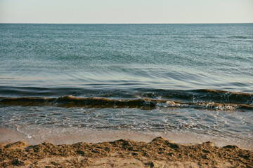 peaceful, calm seascape at sunset in sunny weather
