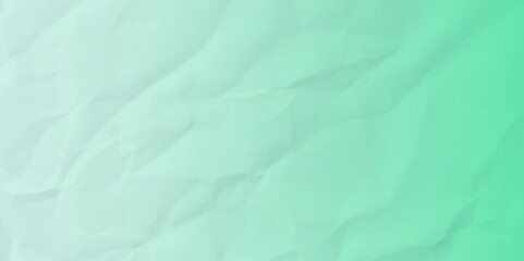 Abstract light green mint gradient paper wrinkled or crumpled texture background 