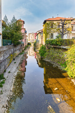 The small river that runs through the city of Bergamo Italy